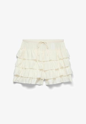Shorts couleur crème avec des volants superposés et une taille élastique avec un cordon de serrage.