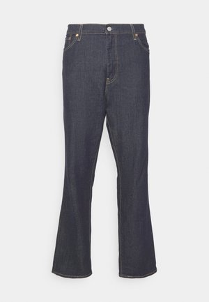 Donkerblauwe denim flared jeans met een hoge taille, afgewerkte randen en contrasterende oranje stiksel. Voorzien van voorzakken en een knoopsluiting.