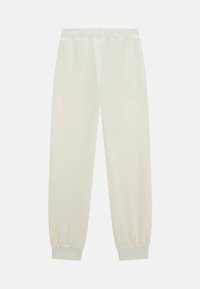 Pantaloni jogger leggeri color crema con una texture liscia, vita elastica e polsini affusolati. Design semplice senza pattern o decorazioni visibili.