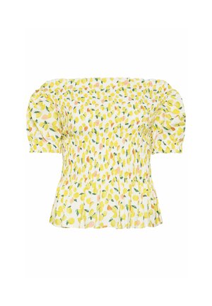 Blusa bianca con spalle scoperte, maniche a sbuffo e stampa di limoni gialli, con vita arricciata e orlo leggermente svasato.