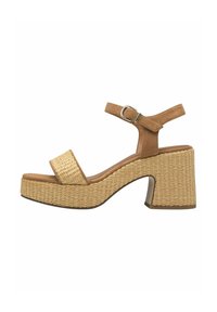 Sandali con piattaforma marroni caratterizzati da dettagli in paglia intrecciata, una larga fascetta anteriore, una cinghia alla caviglia con fibbia e un tacco a blocco spesso.