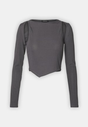 Gray long-sleeve cropped top with ribbed texture, featuring a round neckline and cut-out shoulder details for a layered design effect.