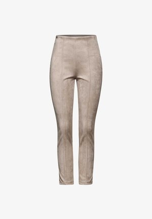 Leggings de tipo ante sintético en color beige con cintura alta, que presentan detalles de costura vertical, corte ajustado y diseño hasta los tobillos.