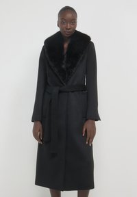 Calliope CON EFFETTO - Cappotto classico - nero