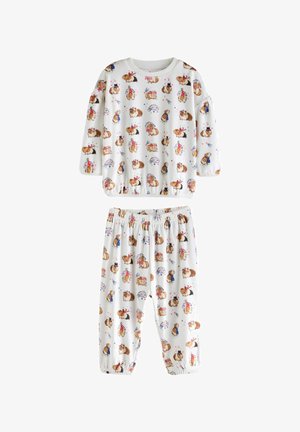 Ensemble de pyjama en coton blanc comprenant un haut à manches longues et un pantalon, orné d'imprimés d'animaux en cartoon colorés, avec des poignets et une taille élastiques.
