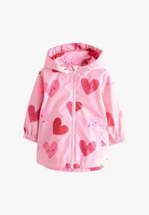Roze kinderjas met capuchon en ritssluiting, versierd met glimlachende hartvormen in verschillende tinten rood en roze.