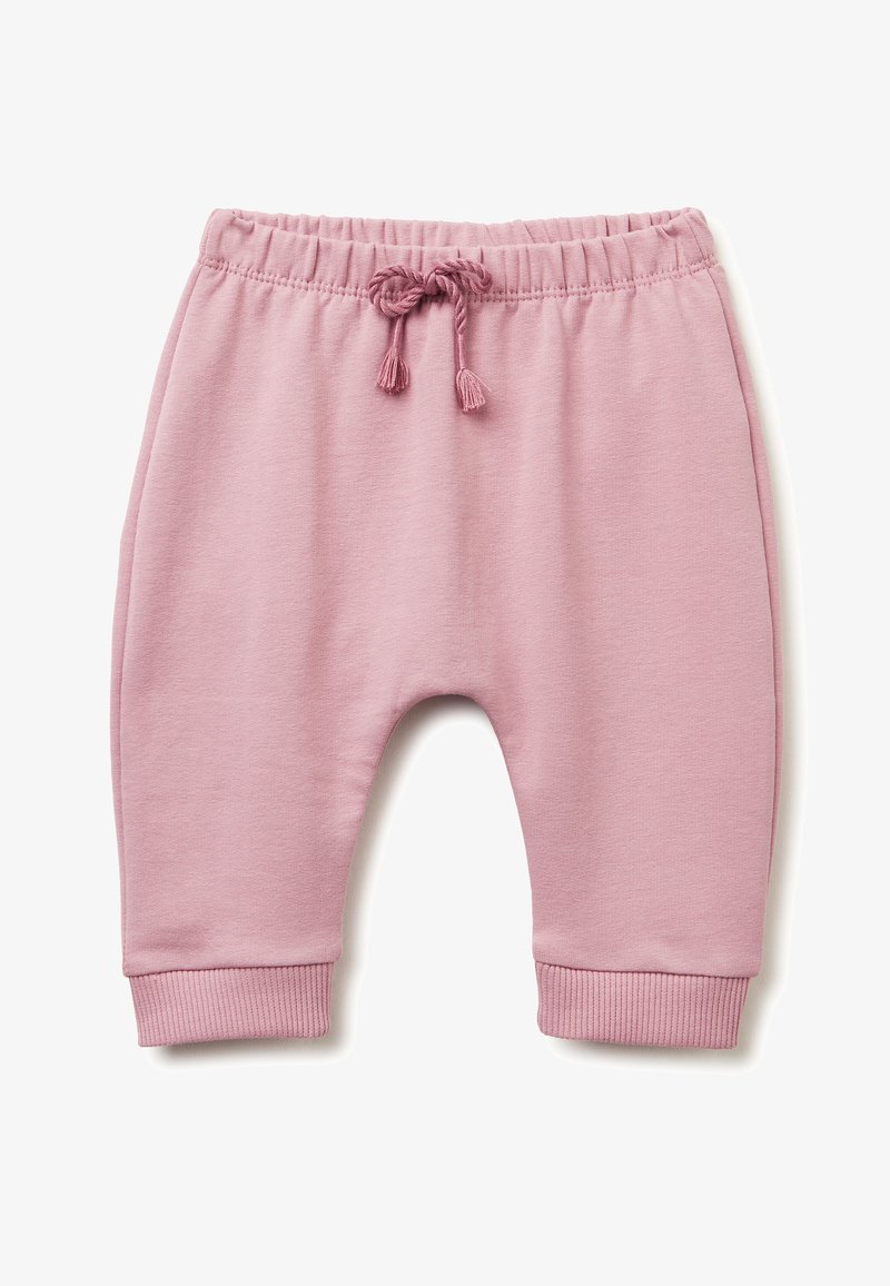 Růžové tepláky s elastickým pasem a šňůrkou. Hladké manžety na kotnících. Měkká tkanina s hladkým povrchem. Bez vzorů a zdobení.