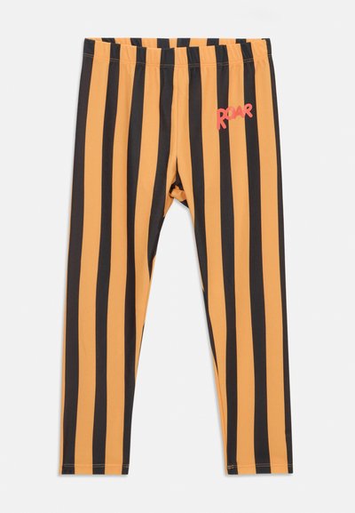 Μαύρο και πορτοκαλί ριγέ κολάν με ελαστική μέση και την λέξη "ROAR" τυπωμένη με �κόκκινα γράμματα στην άνω αριστερή πλευρά του ποδιού.