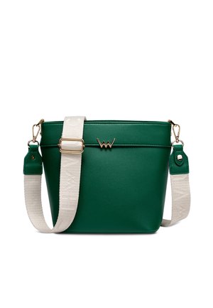 Green faux leather bucket bag with a gold logo accent. Includes a wide adjustable strap in light fabric with text pattern. Smooth texture.