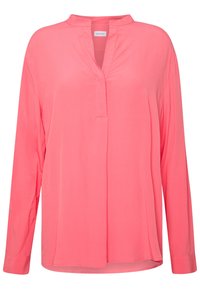 Long-sleeve coral pink blouse with V-neck slit and band collar, made from smooth, lightweight fabric.