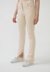 Touché Privé Nadrágok - beige