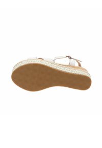 Sandalo bianco in pelle con suola intermedia in juta intrecciata, suola in gomma e un motivo di presa solido. Presenta una fascetta regolabile alla caviglia per una vestibilità personalizzata.