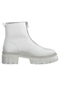 White ankle boots made of smooth leather with a side zipper. Chunky white sole with textured grooves. Minimalist design and slim profile.