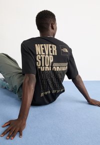The North Face COORDINATES TEE - Print T-shirt - black