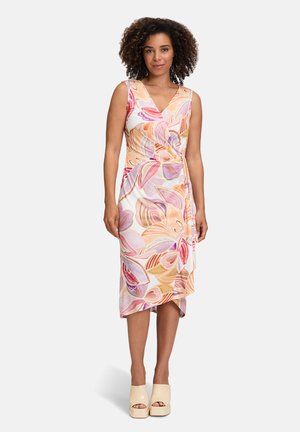 Bloemige wikkeljurk in pastelkleuren met grote roze en oranje bloemenpatronen. Heeft een v-hals en een knielange zoom. Zachte, lichte stof.
