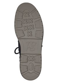 Talpa de pantof sport negru cu un model de aderentă, având forme „X” ridicate, suprafață texturată și embossing al logo-ului în centrul ei.