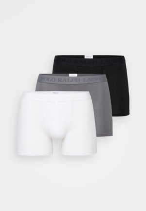 Tri pares bokseric v beli, sivi in črni barvi. Narejeni iz mehkega materiala z elastičnimi pasovi, ki nosijo vtisnjen napis "POLO RALPH LAUREN".