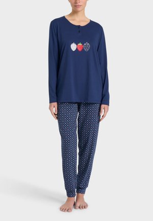 Il pigiama navy include una maglietta a maniche lunghe con tre fragole e pantaloni con motivo. Tessuto morbido, dettagli a pois, vestibilità comoda.