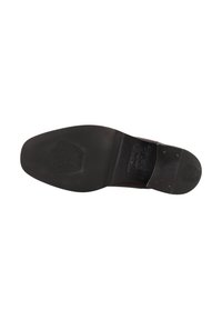 Suela de zapato de cuero marrón con un tacón de goma negra y lisa. Presenta detalles del logo en relieve y una superficie texturizada cerca del tacón.