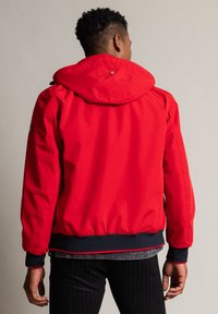 Wellensteyn Regenjacke / wasserabweisende Jacke - rot