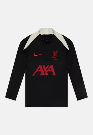 Zwarte atletische langemouwen top met een hoge kraag, rood Liverpool FC-logo, rode Nike swoosh en witte schouderaccenten, met een ritssluiting aan de voorkant.