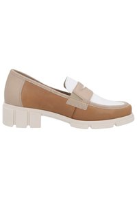 Brown and beige leather slip-on shoe with a white accent. Features a rounded toe and chunky white sole with rectangular cutouts for texture.