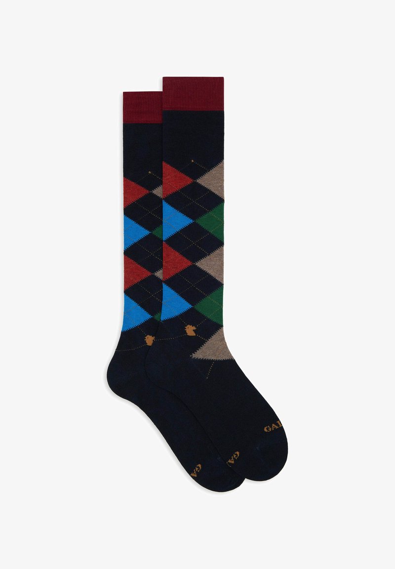 Knee-high socks in dark navy with an argyle pattern featuring red, blue, green, black, and beige diamonds. Ribbed burgundy top.