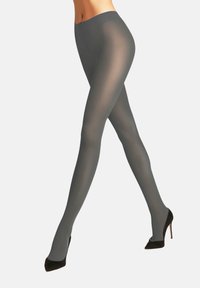 Undurchsichtige graue Strumpfhosen mit glatter Textur, hohem Taillenbund und figurbetontem Schnitt, kombiniert mit schwarzen High Heels.