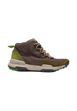 Brown and green hiking boot with beige laces, speckled beige sole, and black and green tread, shown from the side on a white background.