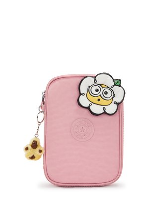 Small rectangular pink Kipling pouch with flower-shaped cartoon patch and fluffy monkey keychain attached to zipper.