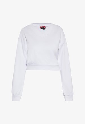 Sudadera corta blanca con mangas largas, escote en V y puños elásticos. La tela parece suave y lisa, diseñada para un uso casual.