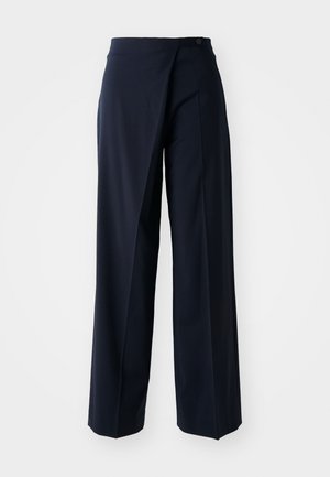Navy wide-leg trousers featuring a wrap design, smooth fabric, high waist, and a single button closure at the front.