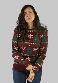 Knit sweater in burgundy with green Christmas trees, white snowflakes, and yellow accents. Ribbed cuffs and round neckline. Textured fabric.