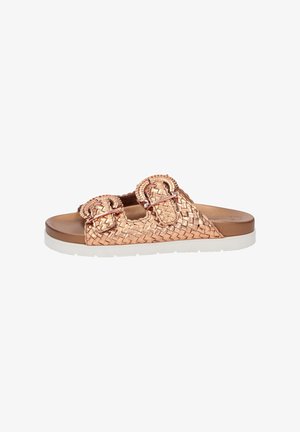Rose gold woven slide sandal featuring two buckle accents, a smooth footbed, and a white rubber sole. Textured upper and flat design.