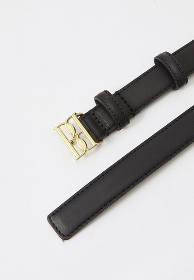 Black leather belt with a gold metal buckle featuring a decorative design; smooth texture with neat stitching along the edges.