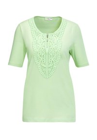 Top verde chiaro a maniche corte con ricami dettagliati sul colletto e una zip centrale. Tessuto morbido e elasticizzato.