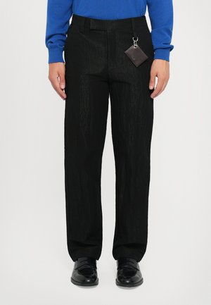 CRUSHED SLIM - Trousers - black