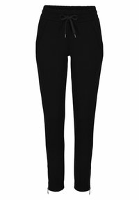 Črne trenirka z elastičnim pasom, vrvico, stranskimi žepi in zadrgami na gležnjih. Narejene iz mehkega materiala.