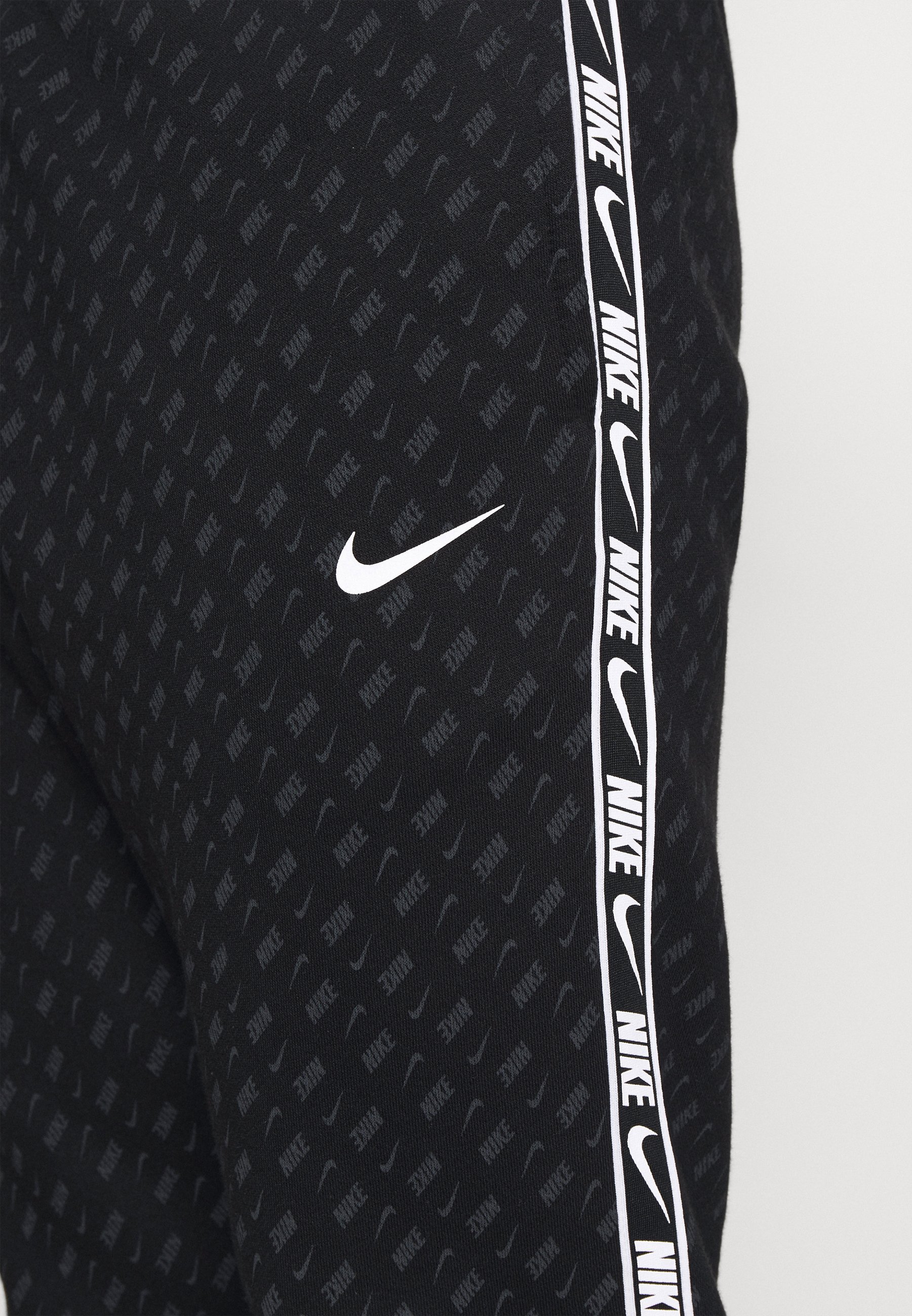 nike repeat print tracksuit