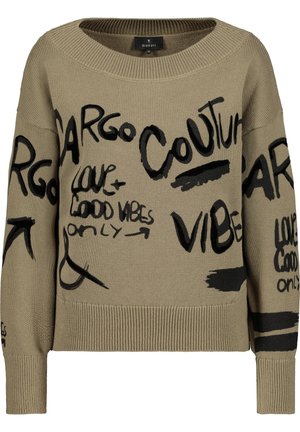 Beige neulottu paita, jossa mustaa graffitityylistä tekstiä, kuten "Couture", "Vibes" ja "Love Good Vibes Only", pyöreä pääntie ja resorit hihansuissa.