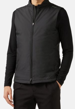 Zwarte geïsoleerde vest met een hoge kraag, rits aan de voorkant en zijzakken. Glad stoffen met subtiele stiksels.