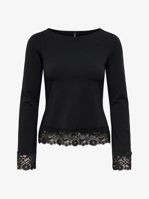 Haut noir à manches longues ajusté avec encolure bateau, orné d'un bord en dentelle florale au bas et aux poignets.
