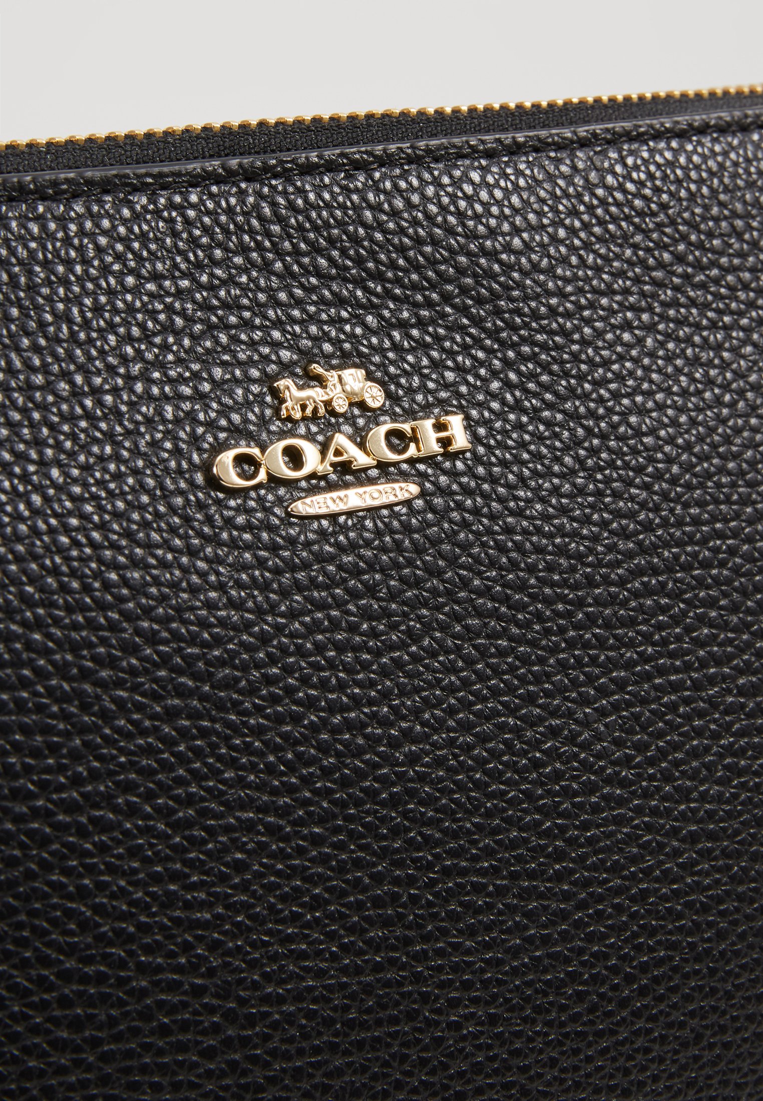 coach large charlie pouch