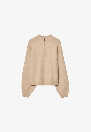 Beige strikpullover med høj hals, halv længde lynlås og drop-shoulder ærmer. Har ribbede kanter og manchetter.