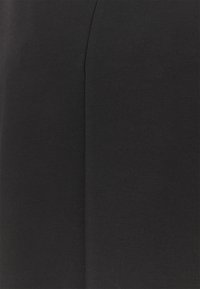 Black fabric close-up with a smooth texture and subtle sheen; features a clean, minimal design without patterns or embellishments.