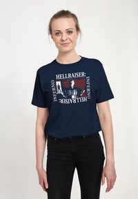 Navy blue cotton t-shirt featuring "Hellraiser: Inferno" graphic print on the front, depicting a character with intricate detailing.