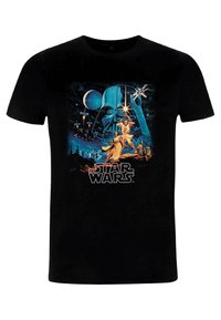 T-shirt en coton noir avec un design graphique de personnages d'un univers spatial, avec des couleurs vives bleu et orange.