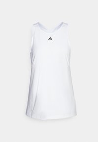 Biała, bezrękawnikowa koszulka sportowa wykonana z lekkiego materiału. Posiada krzyżujące się ramiączka oraz małe czarne logo Adidas na klatce piersiowej.