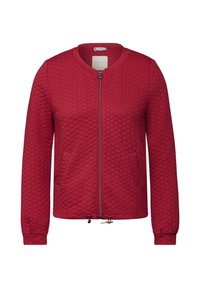 Chaqueta acolchada roja con cuello redondo, cierre delantero y dos bolsillos laterales. Presenta puños elásticos y un cordón en el dobladillo inferior.