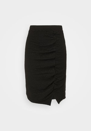 Black knee-length skirt made of textured fabric, featuring gathered detailing on one side and a subtle asymmetrical hemline.